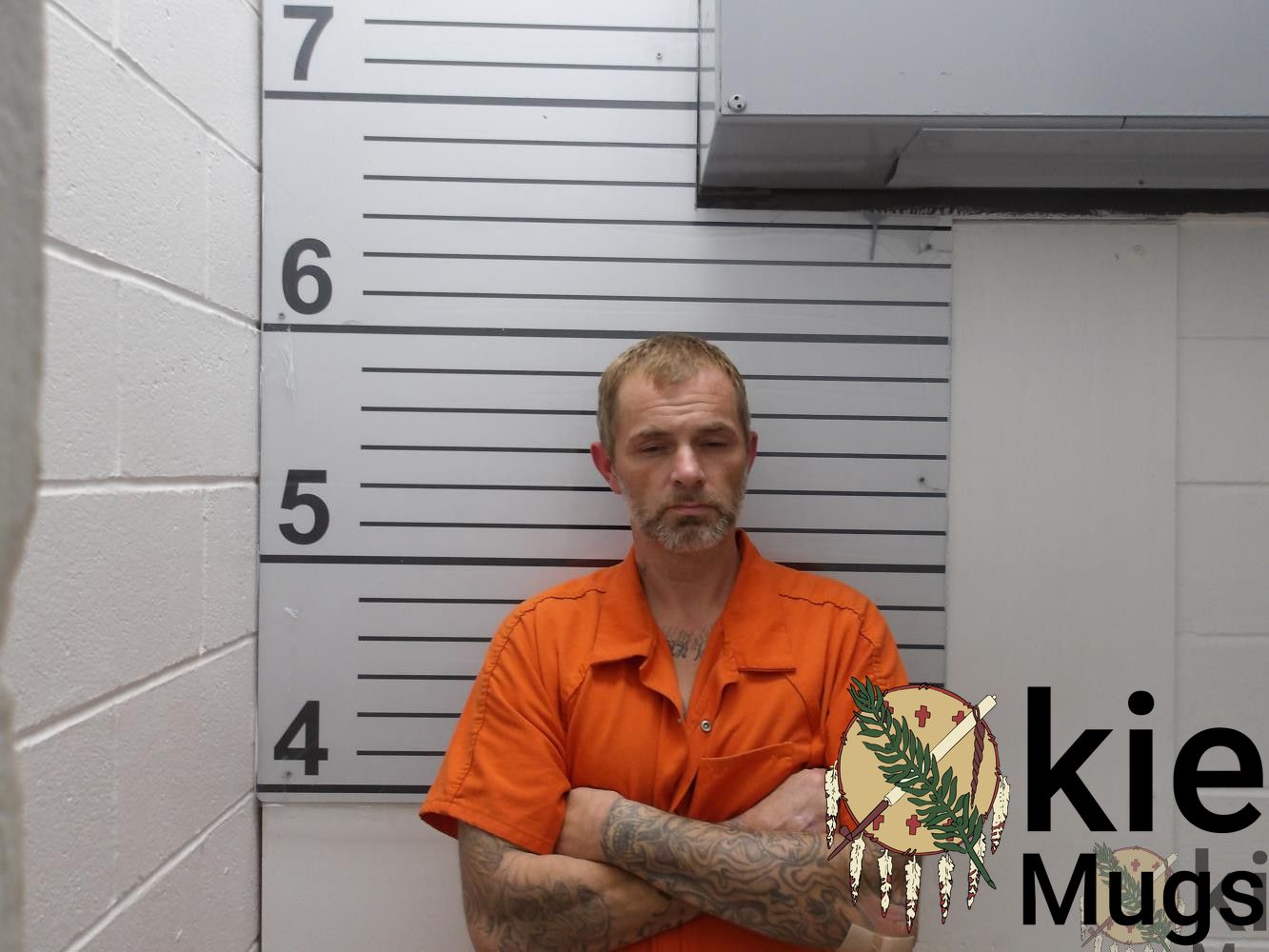 Booking photo of Justin Robert Aaron Lewis
