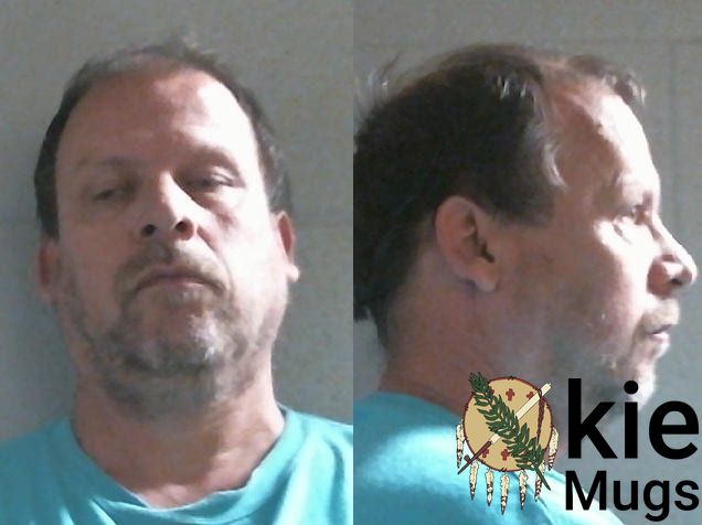 Booking photo of Kenneth Earl Cox