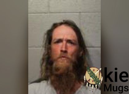 Booking photo of Mickel Allen Hughes
