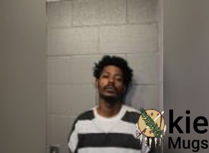 Booking photo of Korlanos Omar Todd