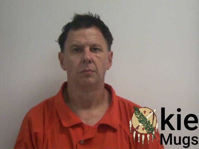 Booking photo of Lewis Clinton Benard