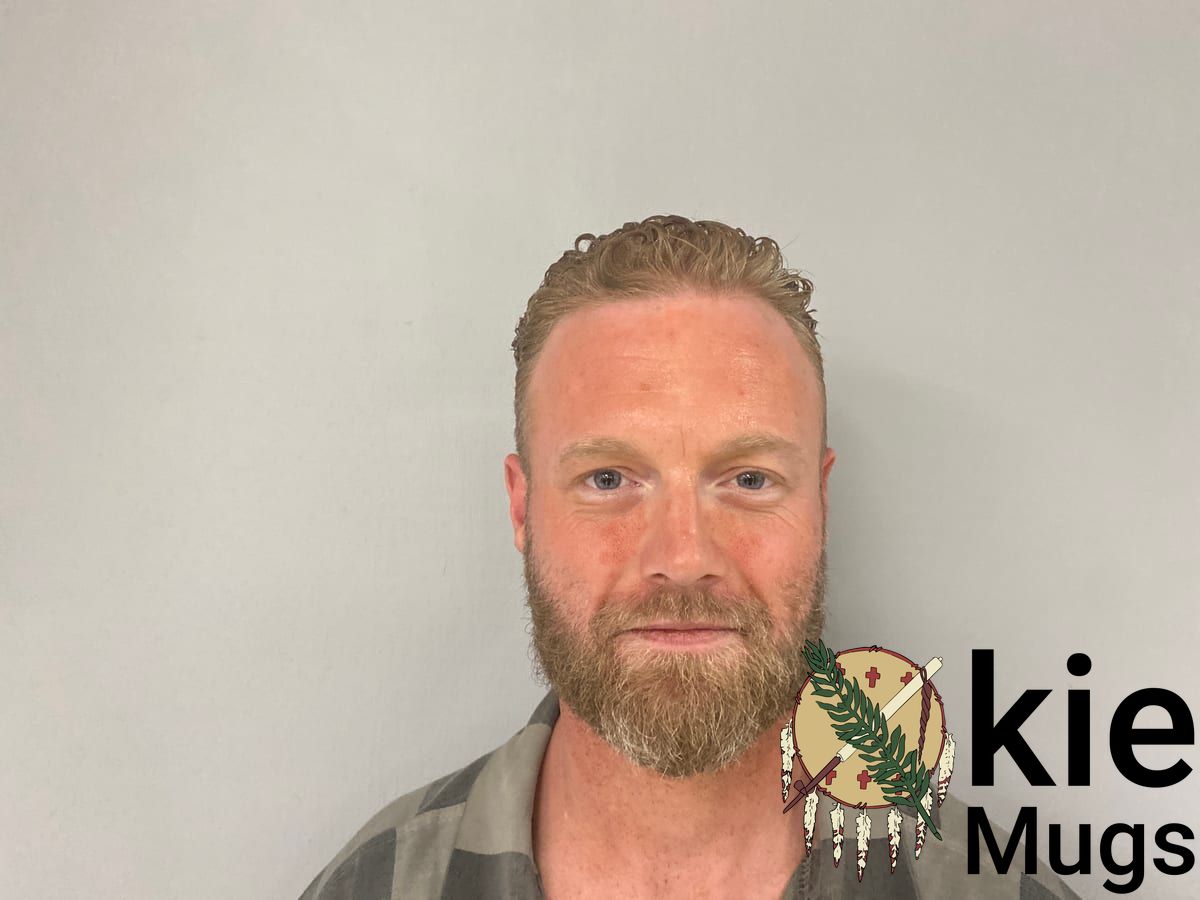 Booking photo of Aaron Hewitt
