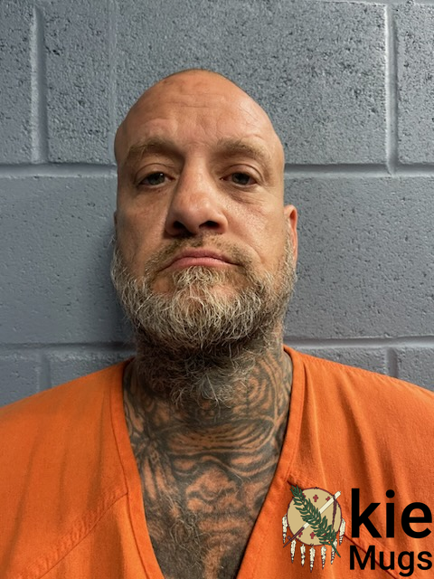 Booking photo of ERIK MUELLER